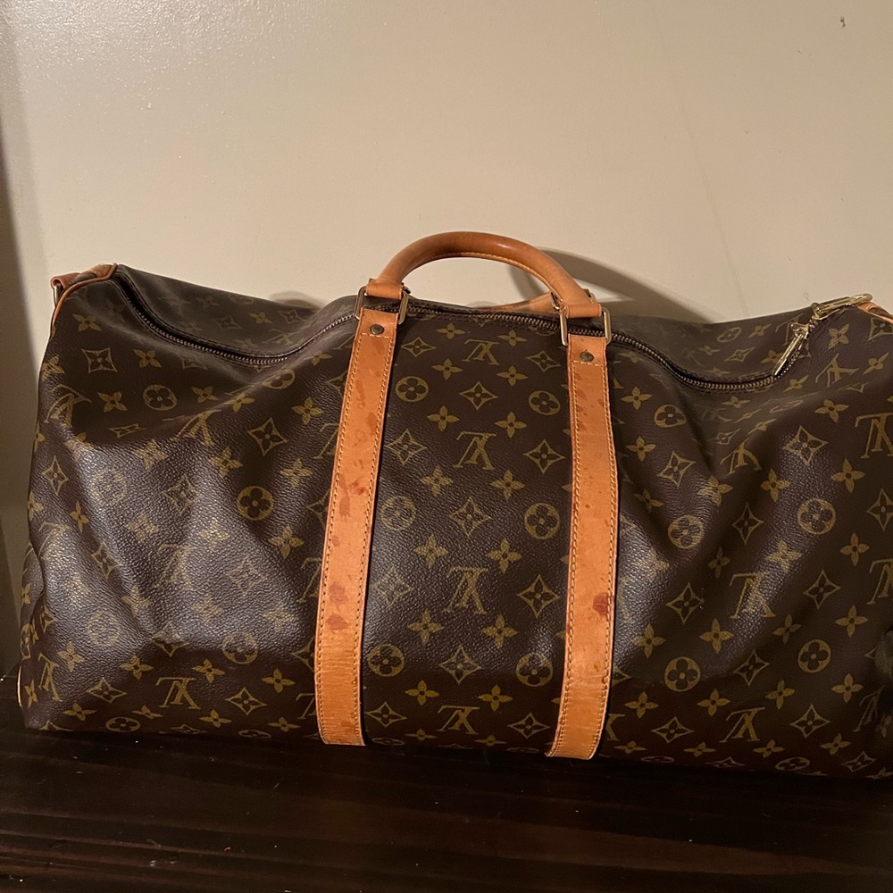 Louis Vuitton Keepall 55. Comes with dust bag & certificate of certification.